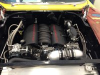 169  Just about done, I like the tidy engine bay with no battery, braided hoses, brushed master cylinder, intake, radiator, and engine brakets. Really ties things together and will be easy to keep clean.  What a great look.