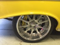 99  I like the look of the rims and tires.  It has a shiny rim ring and brushed center that compliments the moldings and inserts on the car, as well as the Engine bay. The Big Baer yellow brake calipers and drilled rotors behind just add to the look.